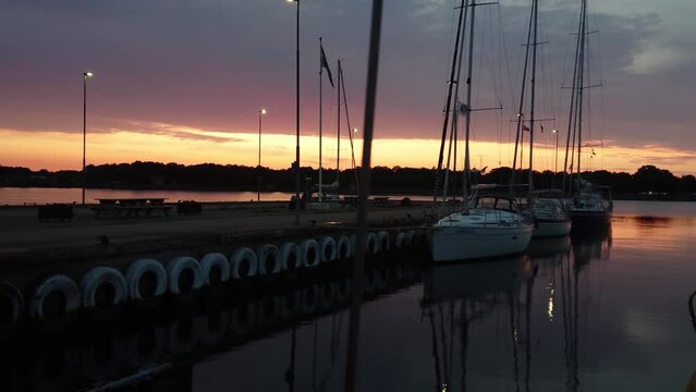 Panorama of the pier against the background of the sunset sky