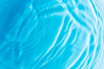 blue water surface,Transparent blue clear water surface texture with ripples, splashes and bubbles....