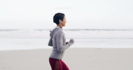 Sports, health and woman running on beach for race, competition or marathon training. Fitness, warm up and young female athlete runner with cardio workout or exercise on the sand by ocean or sea.