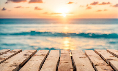 Fototapeta premium Empty wooden table, blurred summer sea background with copy space for your product