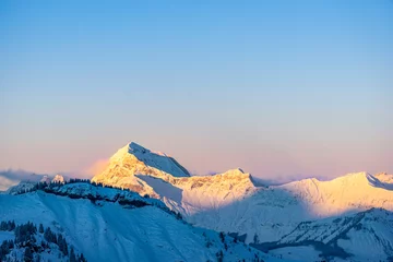 Fotobehang Mont Charvin, Mountain in the french alps covered with fresh snow, in winter. Megève, Haute-Savoie, France © Nicolas Viard