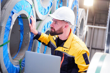 Engineer inspects machinery and equipment Maintenance of machinery in the factory.