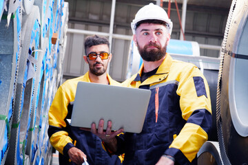 Mechanical engineering inspects metal sheet production machinery and equipment.