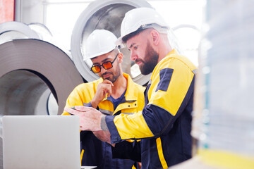 Mechanical engineering inspects metal sheet production machinery and equipment.