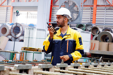 Engineer inspects machinery and equipment Maintenance of machinery in metal sheet production plants.