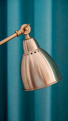 A vintage-looking gold bedside lamp