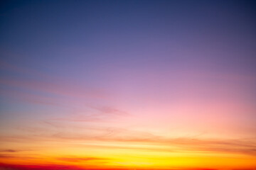 Beautiful of luxury soft gradient orange gold clouds and sunlight on the blue sky perfect for the...