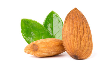 Dried almonds with green leaves. isolated on white background.