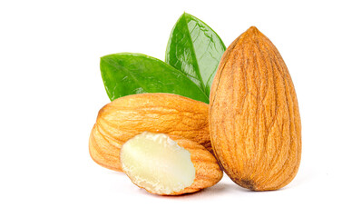 Broken almonds and good almonds with green leaves. isolated on white background.