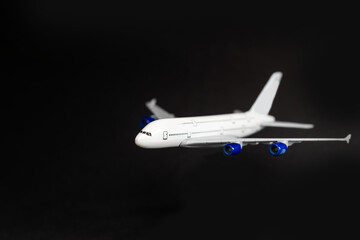 Airplane isolated on dark background
