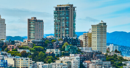 Fototapeta na wymiar San Francisco apartment buildings aerial in residential area on cloudy blue sky day, CA