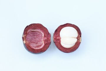 Mangosteen fruits isolated on white with clipping path