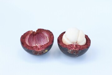 Mangosteen fruits isolated on white with clipping path