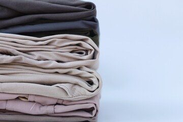 Stack of casual cotton men's trousers