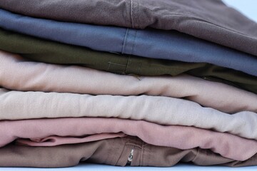 Stack of casual cotton men's trousers