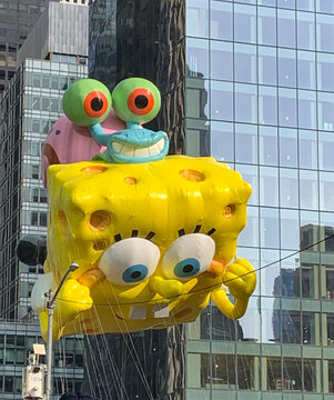 The 95th Annual Macy's Thanksgiving Day Parade SpongeBob SquarePants and Gary balloon viewed from Bryant Park