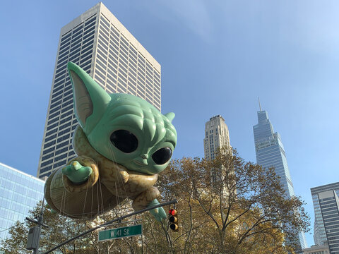 The 95th Annual Macy's Thanksgiving Day Parade Grogu balloon viewed from Bryant Park