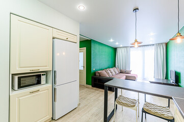 interior apartment kitchen and dining room, refectory area, cooking equipment, table furniture, stove