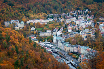 city in the middle of an autumn forest, a famous spa town of Karlovy Vary in the Czech Republic