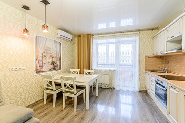 interior apartment kitchen and dining room, refectory area, cooking equipment, table furniture, stove