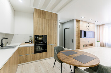 interior apartment kitchen and dining room, refectory area, cooking equipment, table furniture, stove