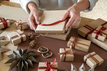 Christmas gift zero waste, eco friendly hand made box packaging gifts in kraft paper wooden table,...