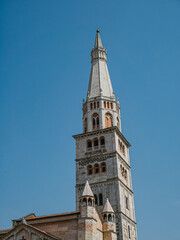Fototapeta na wymiar Ghirlandina tower of the Metropolitan Cathedral or Duomo in Modena, Italy