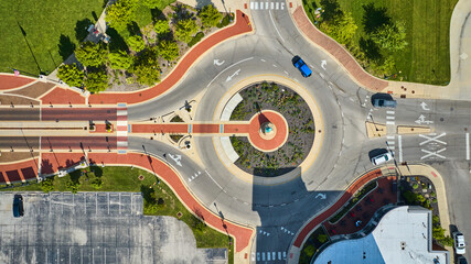 Native American statue Passing of the Buffalo from above in aerial of roundabout on sunny day