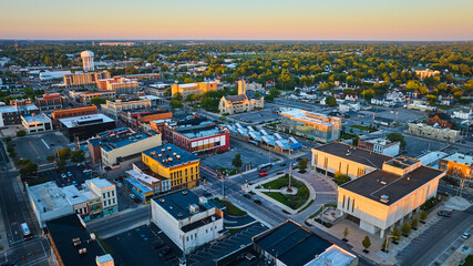 Fototapeta premium Delaware County Court Administration courthouse building aerial of Muncie city at dawn