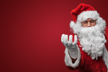 Jolly Santa Claus showing an okay gesture, assuring a merry Christmas
