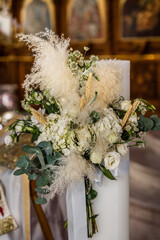 Exquisite Decorated Altar Wedding Candle (Lampade) for Greek Orthodox Ceremony. Ideal for conveying the beauty of religious ceremonies, cultural celebrations, and editorial content. Selective focus