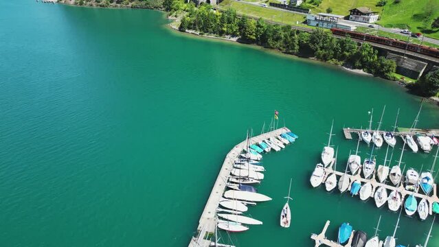 bay with yachts on the shore of a mountain lake. top view.