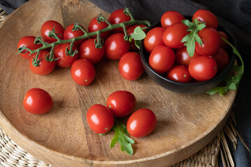 cherry tomatoes on a wooden tray