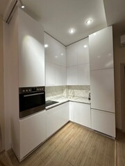 modern white kitchen interior with oven