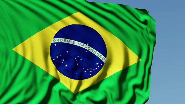Close-up of the national flag of Brazil flutters in the wind on a sunny day , 4k slow motion