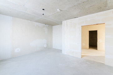 interior apartment rough repair for self-finishing. interior decoration, bare walls of the room, stage of construction