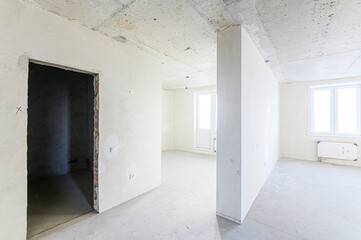 interior apartment rough repair for self-finishing. interior decoration, bare walls of the room, stage of construction