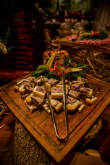 Catering banquet table with different food. Variety of snacks, appetizers, seafood and cooked meals displayed as buffet for wedding, Christmas, business corporate, birthday party or other event