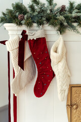 Christmas stockings hanging by fireplace at home