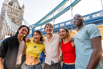 Gartenposter Tower Bridge Multiracial group of happy young friends bonding in London city - Multiethnic teens students meeting and having fun in Tower Bridge area, UK - Concepts about youth lifestyle, travel and tourism