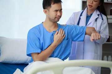 Fototapeta premium The doctor is carefully examining the patient's body to ensure the correctness of the treatment, Doctors use stethoscopes to listen to the patient's body to diagnose disease.