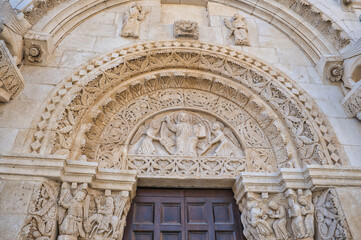 Detailed view of ornate stone carvings of the Church of San Leonardo in Manfredonia, Italy