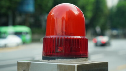 Red warning lights on the side of the road