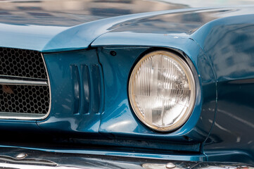 Close-up on the headlights of an old retro car