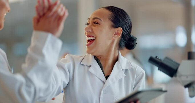 Teamwork, scientist or women high five for success, medicine breakthrough or partnership in lab. Science, collaboration or happy doctors celebrate medical support, goal target or DNA news with smile