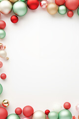 frame made of colorful christmas ornaments