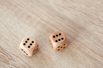 Close-up of wooden dice sitting on a table