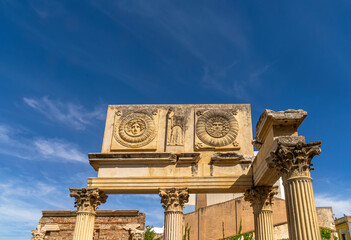 Archaeological remains of the façade of the monumental portico with attic with metopes of the old...