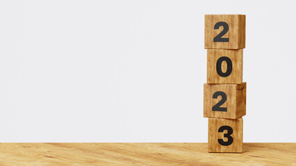 Starting new year 2023. New year, new life, vision, business, action plan, goals, target and strategy concept. 2023 on wooden cube blocks on white background. 3d illustration