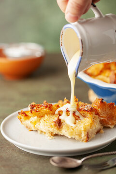 Homemade easy sweet dessert. Bread pudding in baking pan